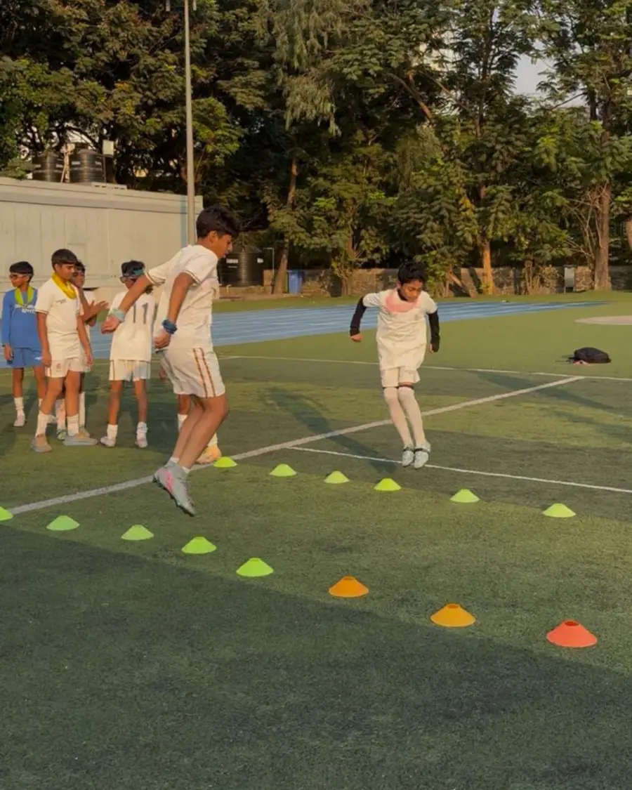 Players running a cone agility drill